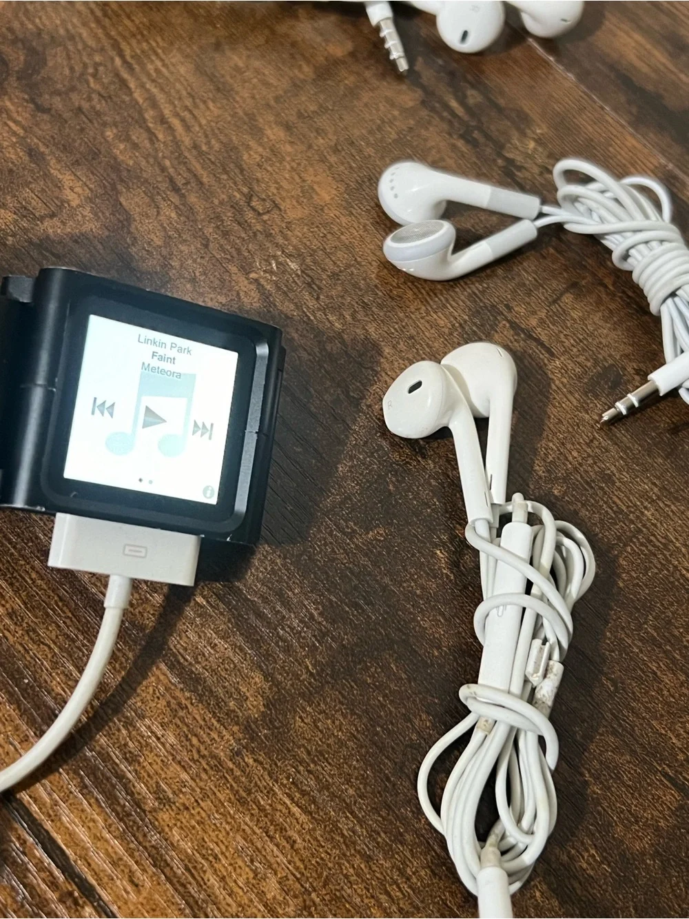 Apple Black iPod Nano with White Earbuds